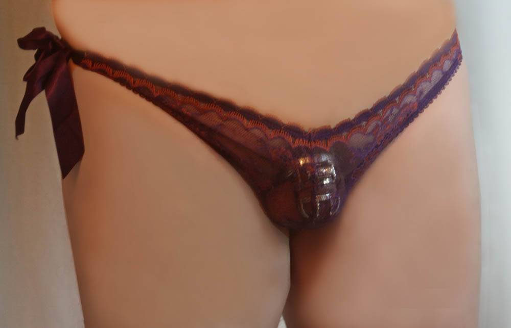 Feminization BDSM — chastity cage and discipline training for sissies